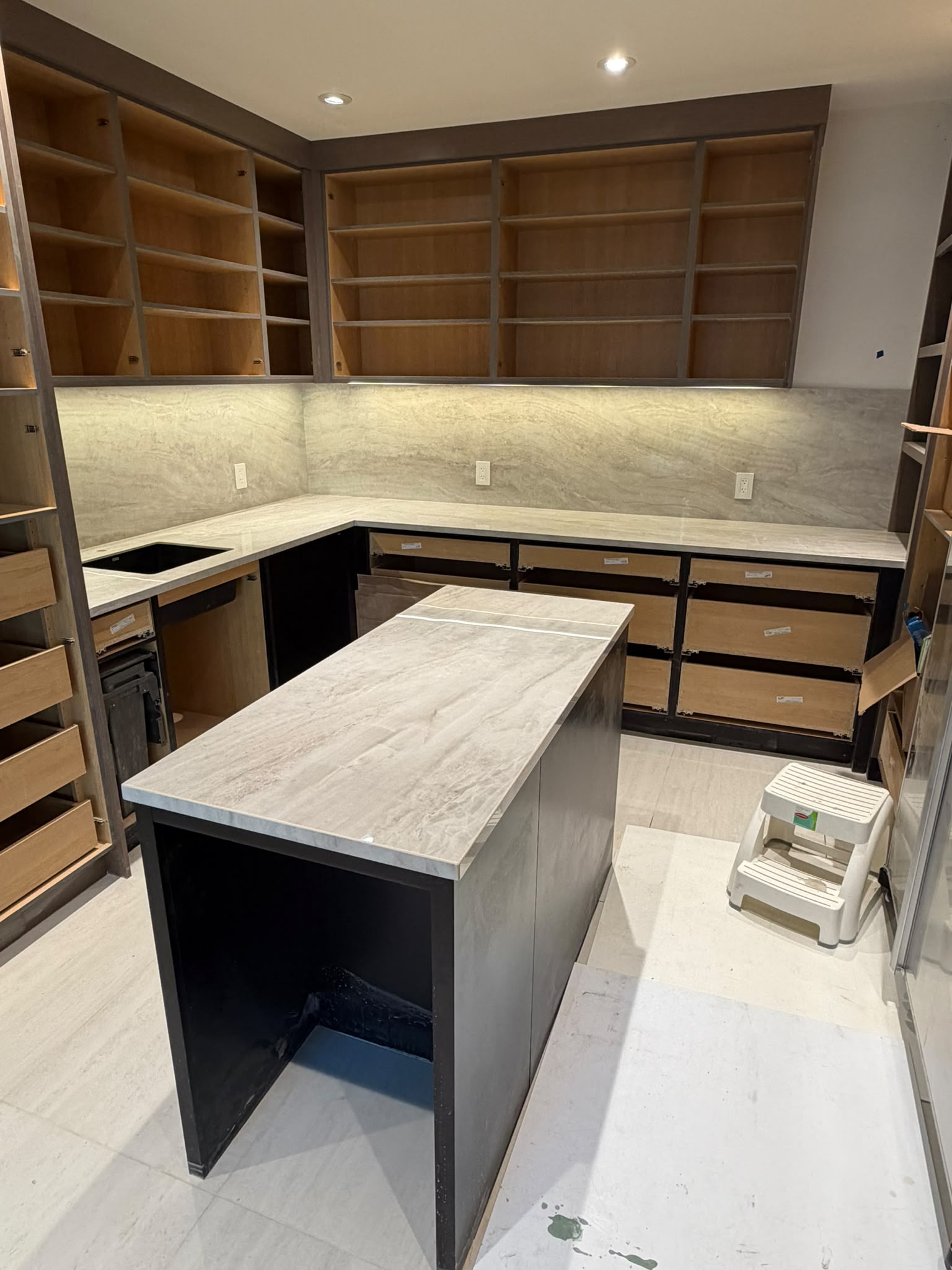 Marble kitchen island with natural veining