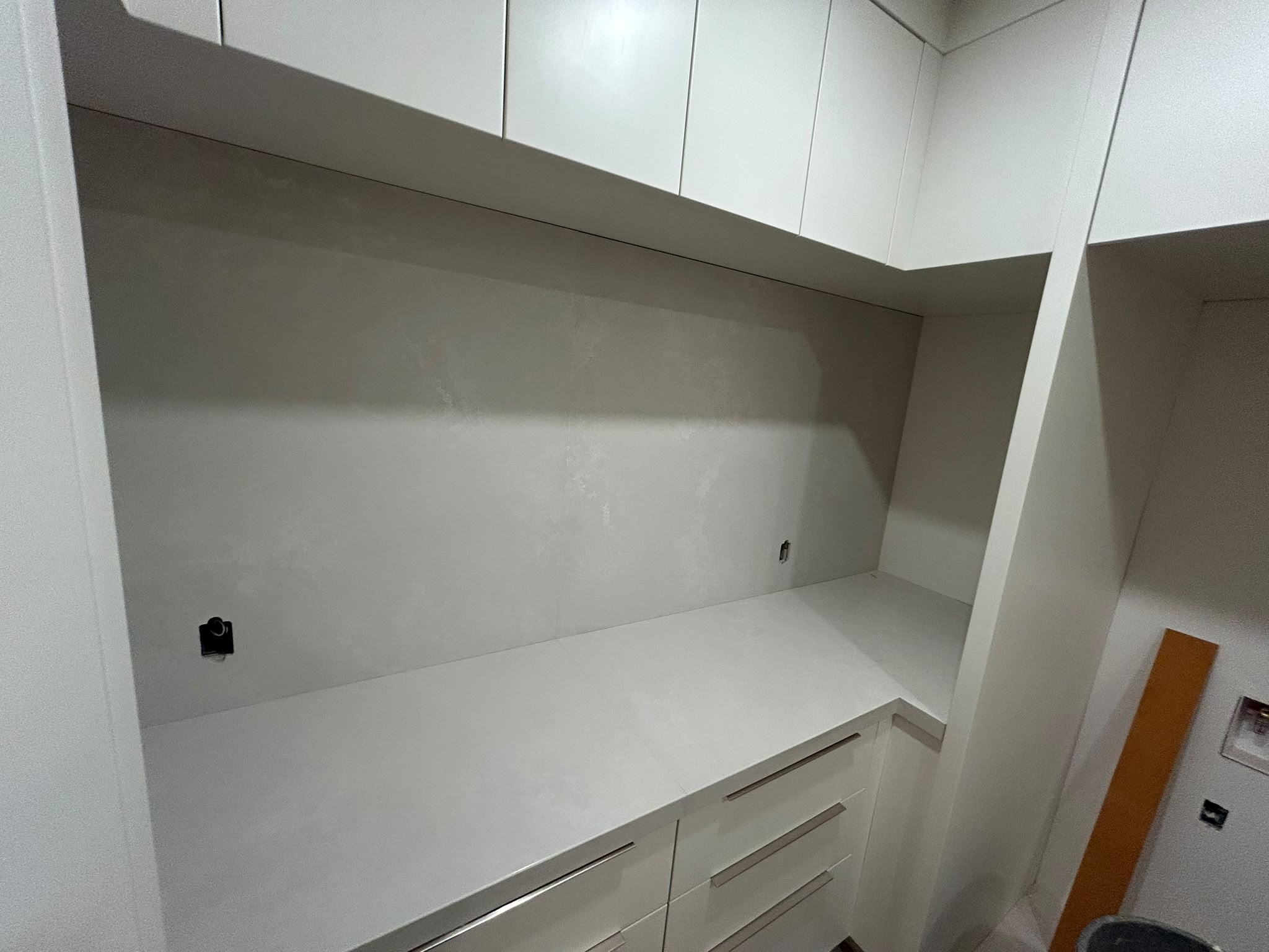 Built-in desk with stone countertop from a remnant slab